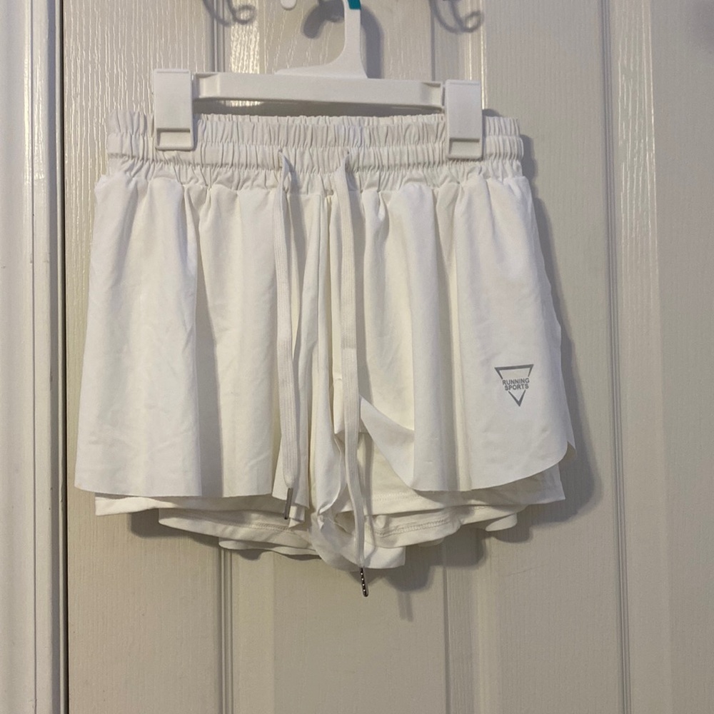 White butterfly shorts new without tags and has never been worn
